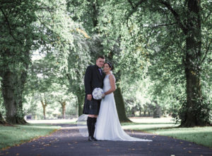 Bride and groom, kilts, kay park, greenery