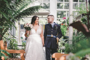 bride and groom, conservatory with lovely flowers