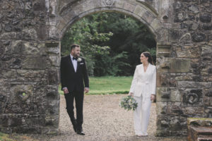 Bride and groom in Castle Arch at Rowallan castle